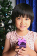 Girl holding present