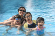 Photo: Mother and kids in the pool Mother and kids in the pool