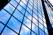 clouds in glazed panel skyscraper