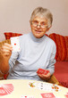 Photo: Senior with Card Game - Seniorin mit Kartenspiel Senior with Card Game - Seniorin mit Kartenspiel