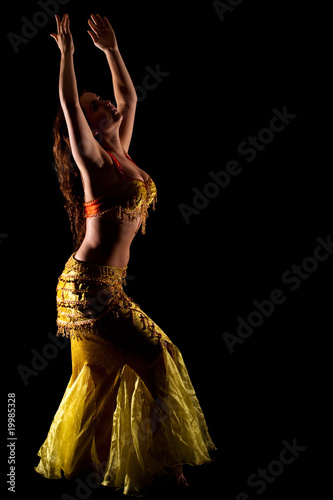 beautiful Bellydancer in golden costume