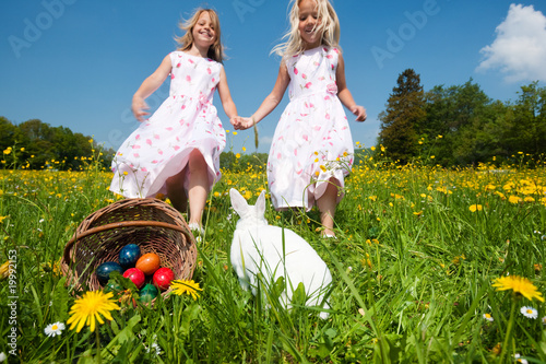 Photo: Easter bunny watching the egg hunt Easter bunny watching the egg hunt
