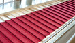 Stairs covered with red carpet