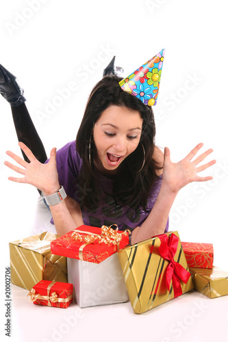 Photo: Beautiful happy girl with a gifts Beautiful happy girl with a gifts