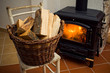Logs in front of a stove