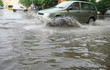 Car on Very Wet Road