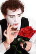 mime holding red  rose , Valentine's day concept