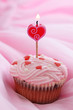 Birthday cake on pink background