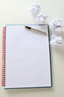 Photo: Fountain pen lying on page in a spiral bound notepad Fountain pen lying on page in a spiral bound notepad