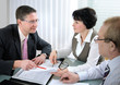 Photo: Senior couple meeting with agent Senior couple meeting with agent