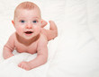 baby on white bed