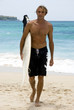 Leaving the water after a nice surf