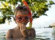 Child with mask and snorkel