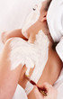 Beautician apply mask to girl. Massage.