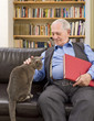 Photo: senior man and cat senior man and cat