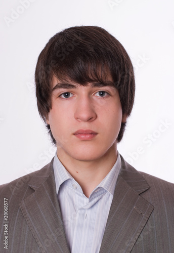 Foto: Young businessman close-up portrait Young businessman close-up portrait