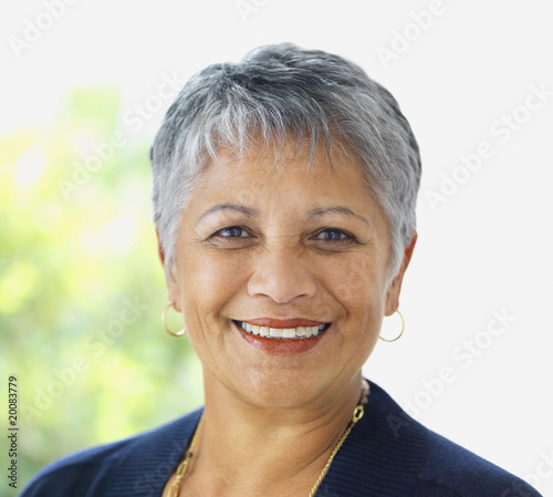 Photo: Closeup portrait of a smiling elderly woman Closeup portrait of a smiling elderly woman