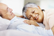 Closeup of a romantic elderly couple looking at eachother