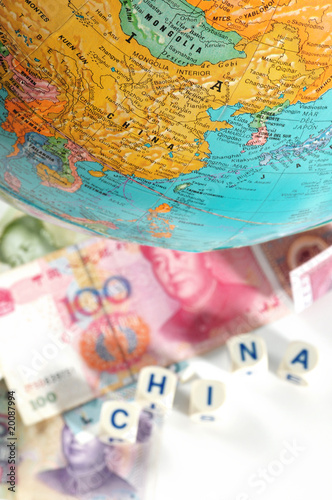 Globe and currencies. Business concept.