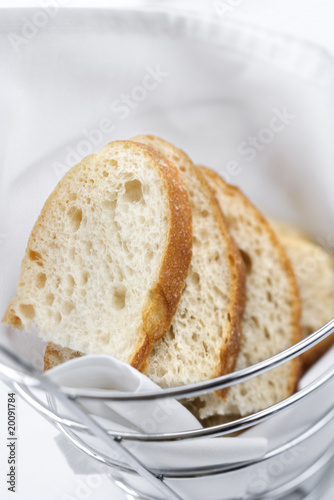 Photo: Sliced Bread in Wire Basket Sliced Bread in Wire Basket