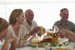 Happy family at a lunch table