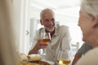 Mature man drinking wine