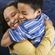Photo: Woman Hugging Son Woman Hugging Son