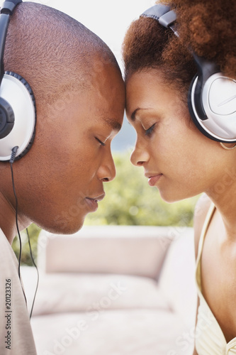 Photo: Romantic young black couple head to head Romantic young black couple head to head