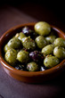 Close-up of a dish of mixed olives