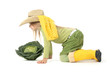Jeune fille avec des bottes jaune un choux et un chapeau de pail