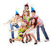 Group of teenagers celebrate birthday.
