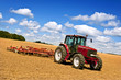 Tractor in plowed field Tractor in plowed field
