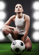 Sexy soccer player, woman on playing field