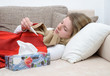 sick woman with clinical thermometer