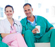 Two doctors relaxing in the staff room