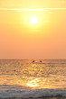 Speed boats at golden sunset on sea Speed boats at golden sunset on sea