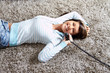 Woman in living room with a phone