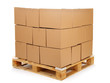 cardboard boxes on wooden palette