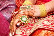 Bride, henna on hands and gold Mughal style jewellery