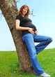 Pregnant woman in nature