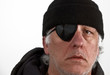 Portrait Handsome older man with patch eye and watch cap hat Portrait Handsome older man with patch eye and watch cap hat