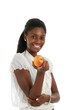 African american woman holding an apple African american woman holding an apple
