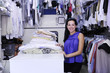 Images : happy owner of a dry cleaning service