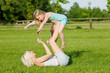 Mother and daughter playing outside