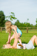 Mother and daughter playing outside