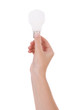 Hand holding an incandescent light bulb isolated on white Hand holding an incandescent light bulb isolated on white