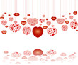 decorative red hearts on strings, with reflection