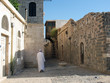 Syria, Hama, downtown. Someone going to a mosque. From wordly v Syria, Hama, downtown. Someone going to a mosque. From wordly v
