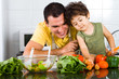 father and son in kitchen
