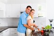 young couple cooking together